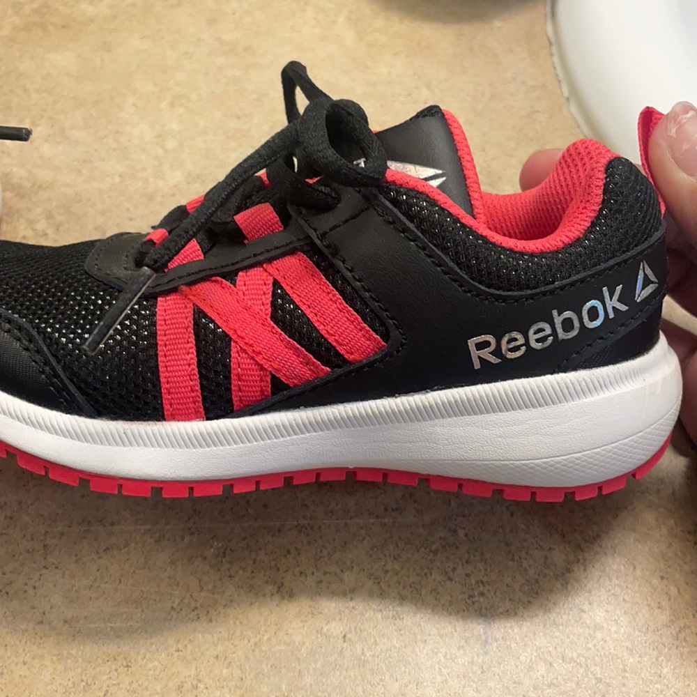 Kids size 10 1/2 hot pink with black Reebok